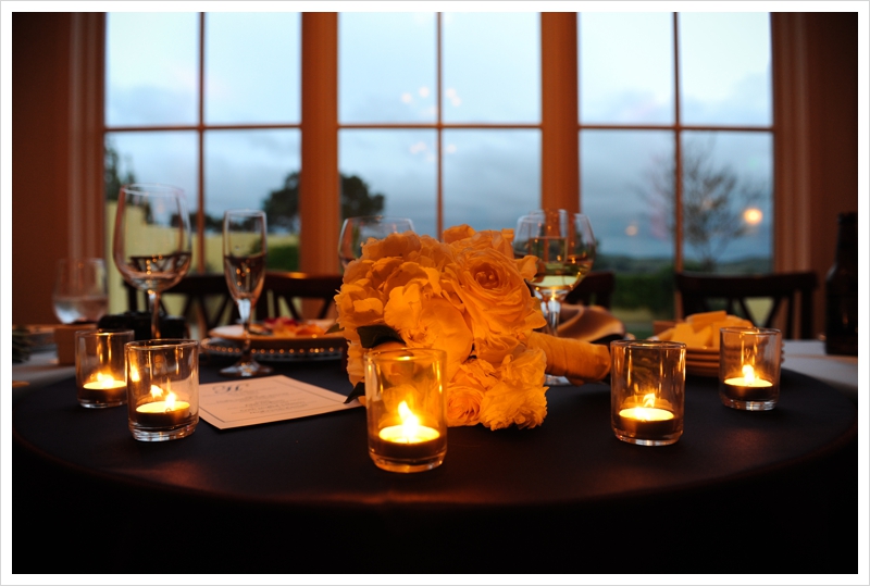 Livermore winery wedding reception head table by candlelight