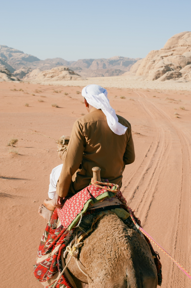 Guide atop his Camel in Wadi Rum