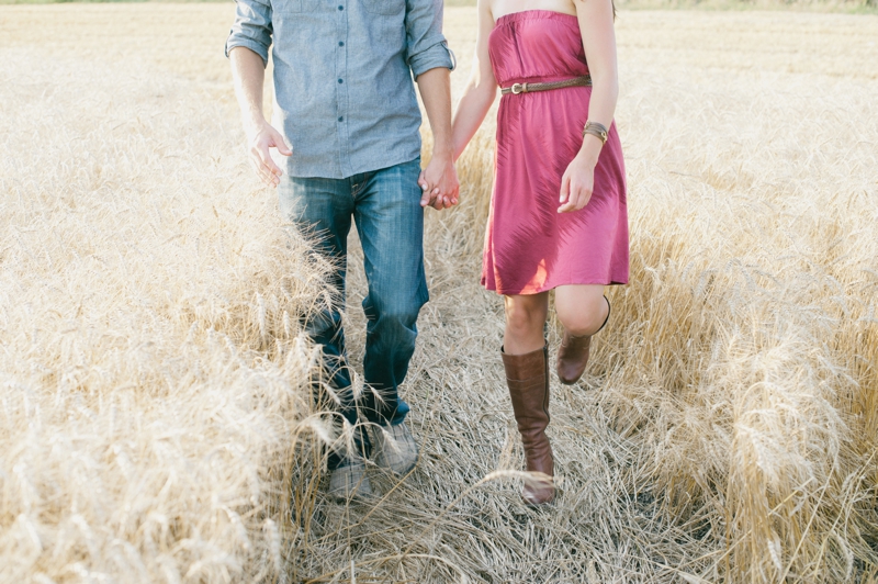 Couple in Manitoba wheat field